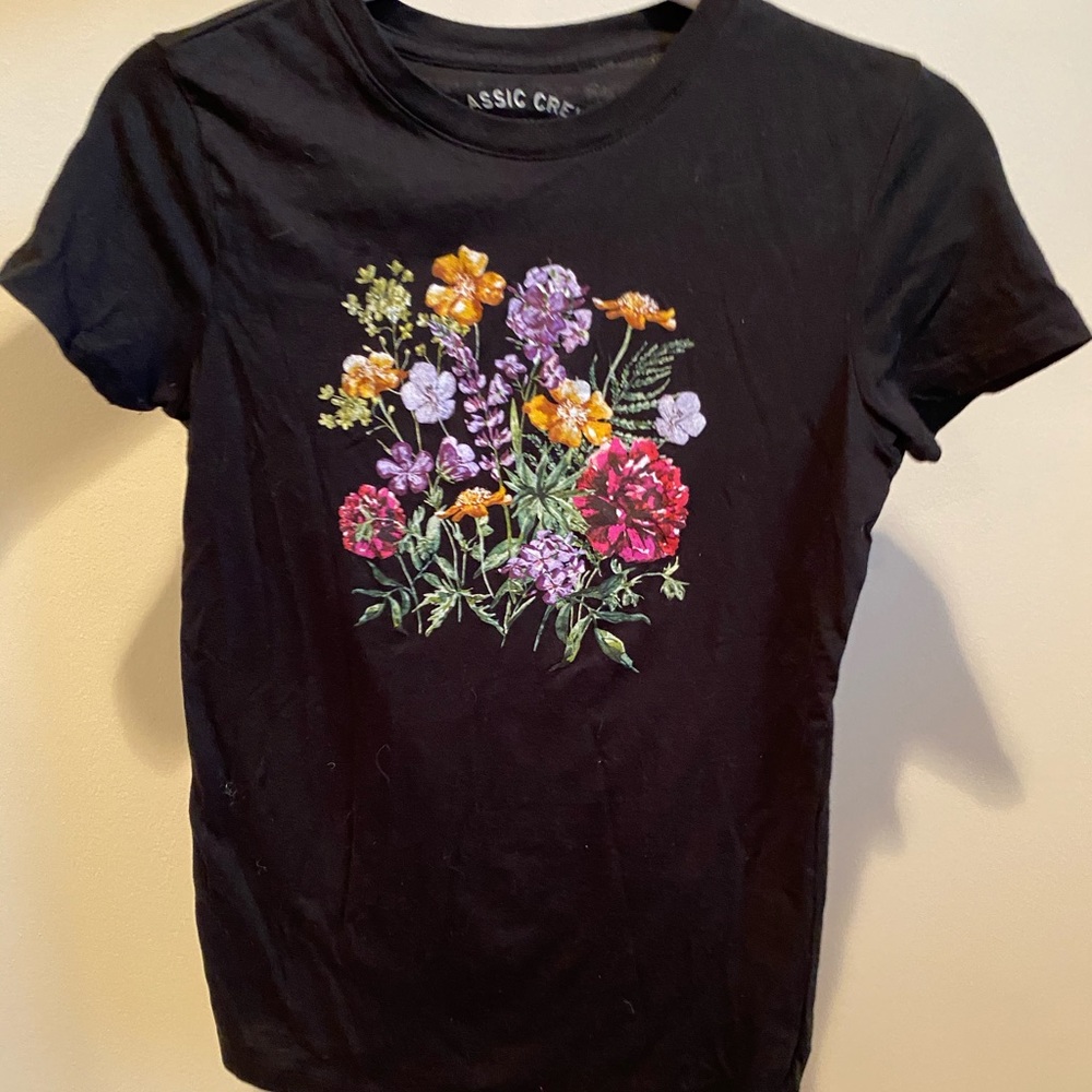 Black t shirt with flowers on it